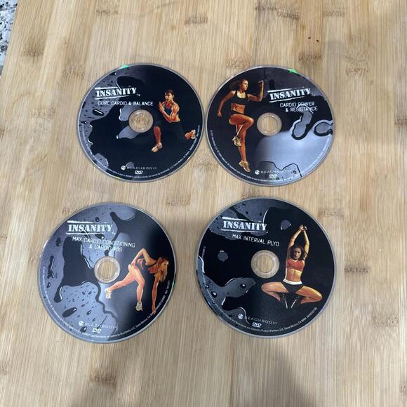 Insanity Total Body Workout Program BeachBody 4 Discs DVD Set Fitness - Picture 1 of 6